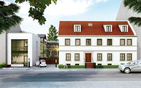 Alt und Neu: Rechts das denkmalgeschützte Wohnhaus des einstigen Meierei-Besitzers Spiegel, links ein moderner Neubau mit ein bis zwei Ladenflächen. Dazwischen befindet sich der Zugang zum Innenhof.